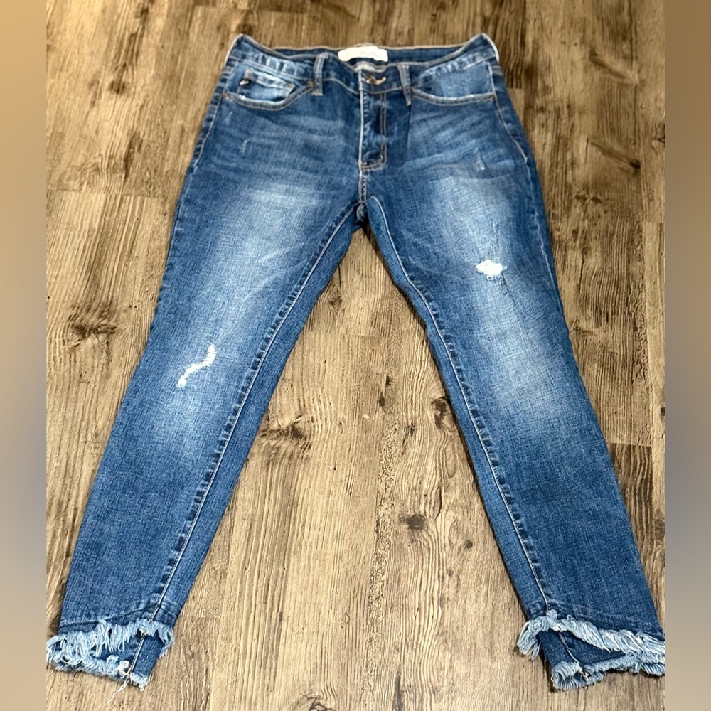 Distressed Blue Jeans